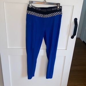 Blue Nike pro leggings with black mesh waistband size L